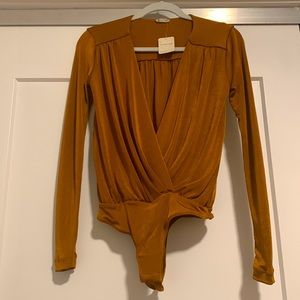 Free People Rust colored bodysuit